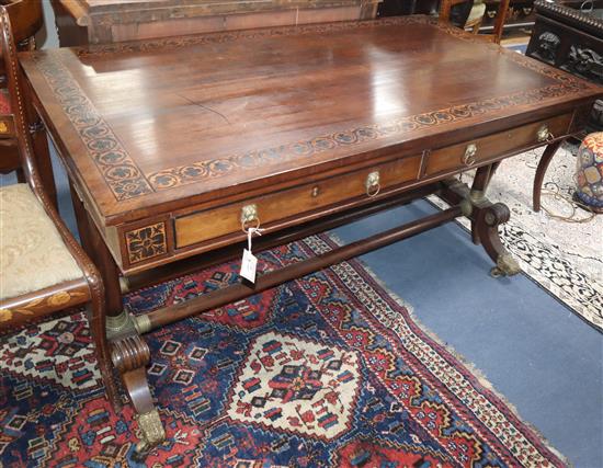 A Regency mahogany and marquetry inlaid library table W.137cm